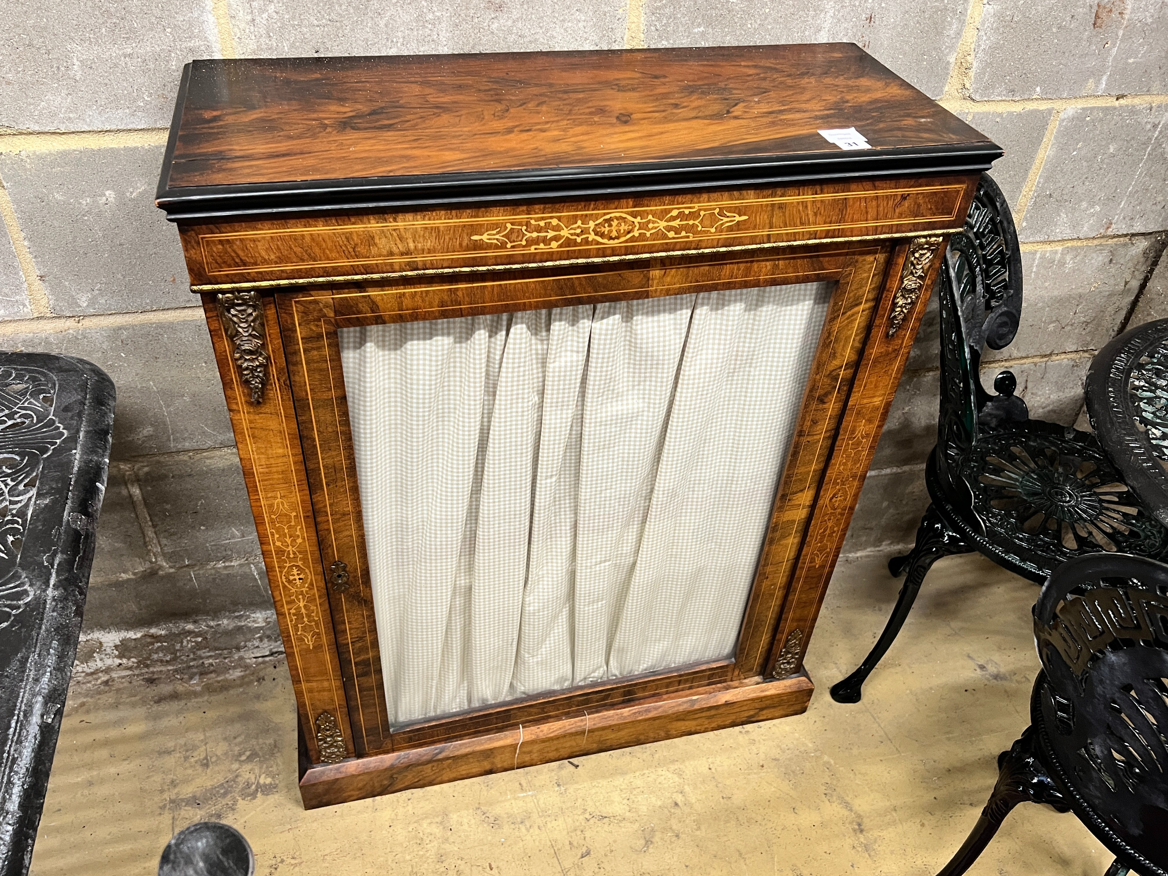 A Victorian gilt metal mounted inlaid walnut pier cabinet, with a single glazed door, width 80cm, depth 32cm, height 99cm